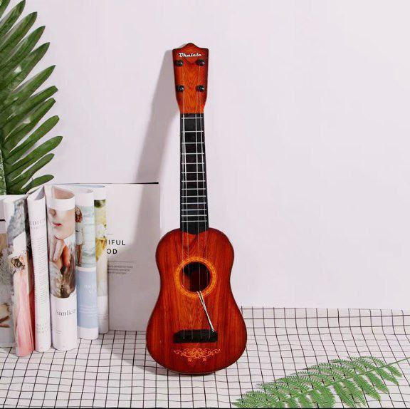 Guitarra mini de 4 cuerdas